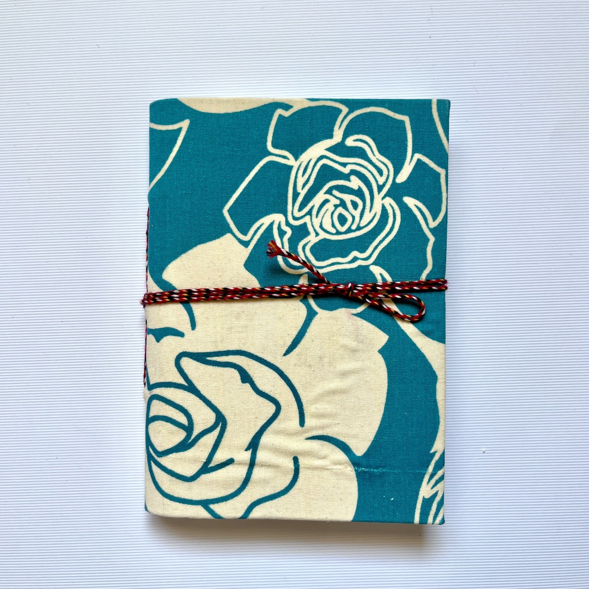 Rose Outline Blue Diary, 5 by 7 inch handmade fabric cover – front cover view