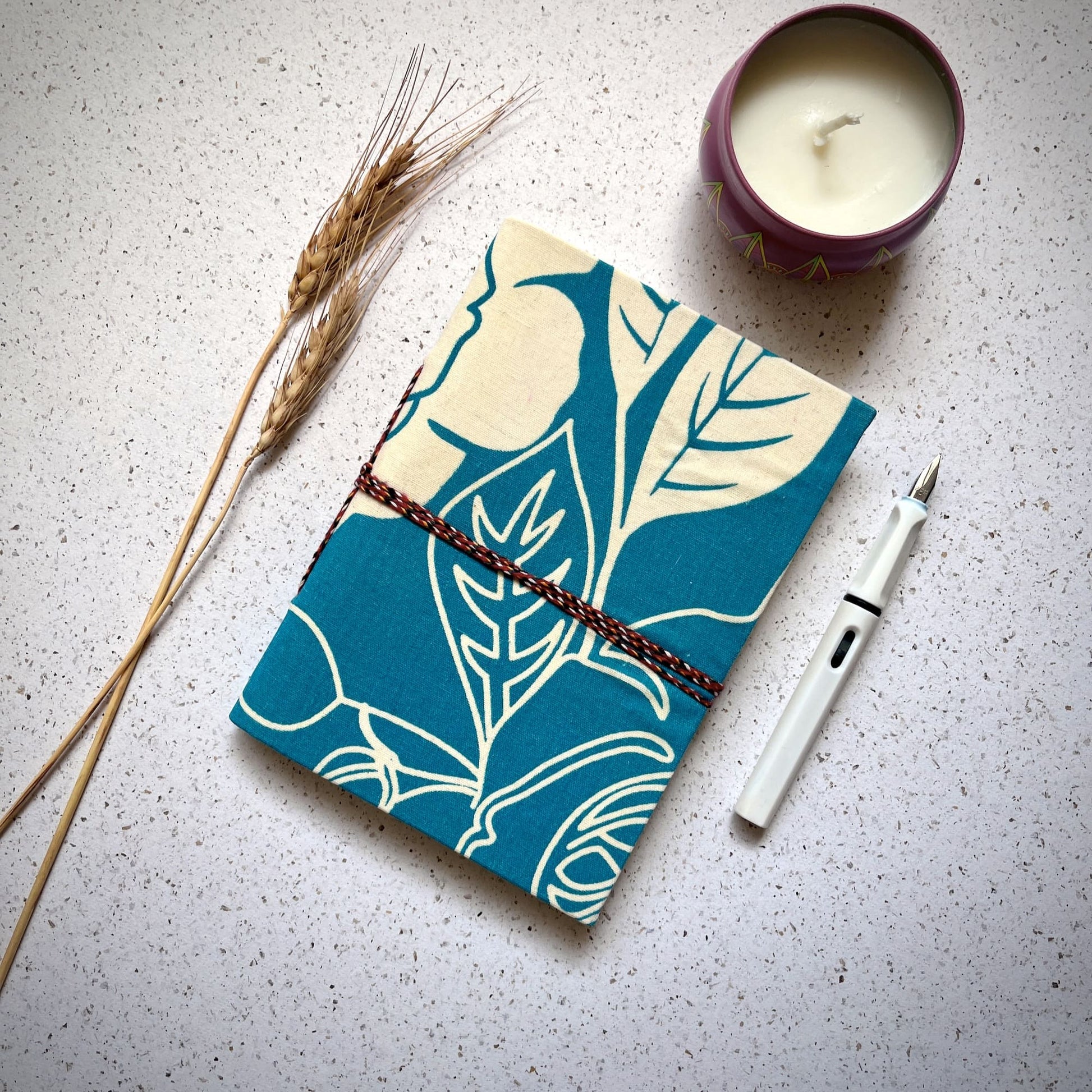Rose Outline Blue Diary styled flatlay with writing accessories
