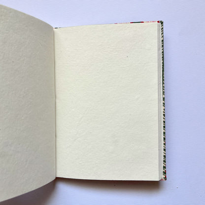Leaf Stripe Green Diary opened to show handmade paper pages