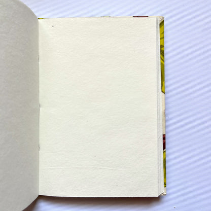Large Floral Green Diary opened to show handmade paper pages