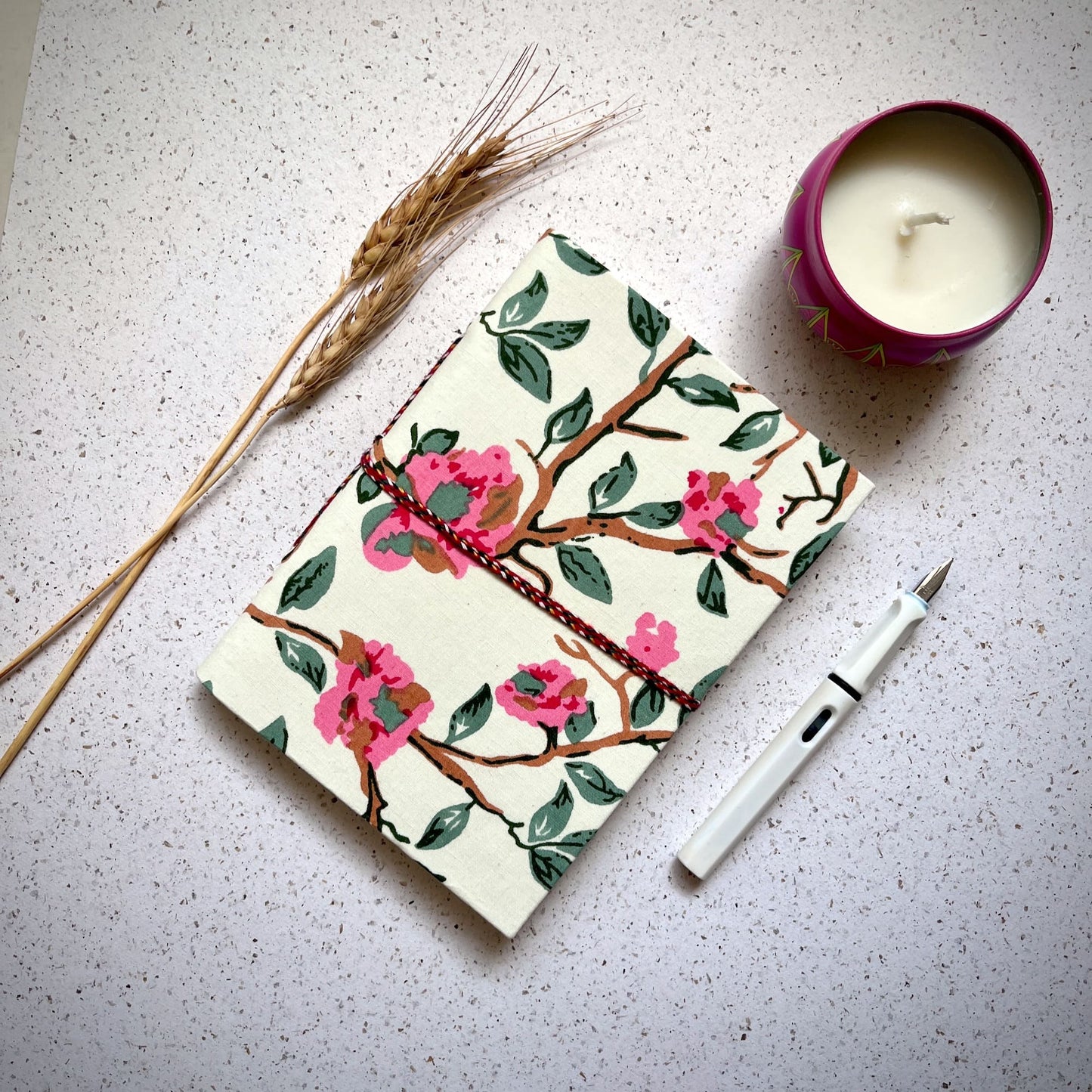 Blossom Branch Off White Diary styled flatlay with writing accessories