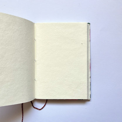 Blossom Branch Off White Diary opened to show handmade paper pages