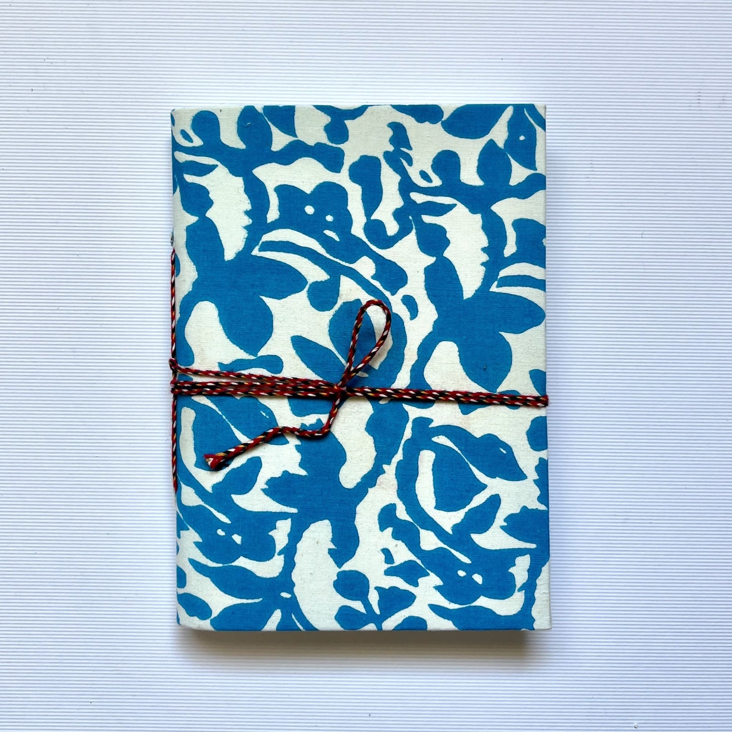 Bold Floral Blue Diary, 4 by 6 inch handmade fabric cover – front cover view