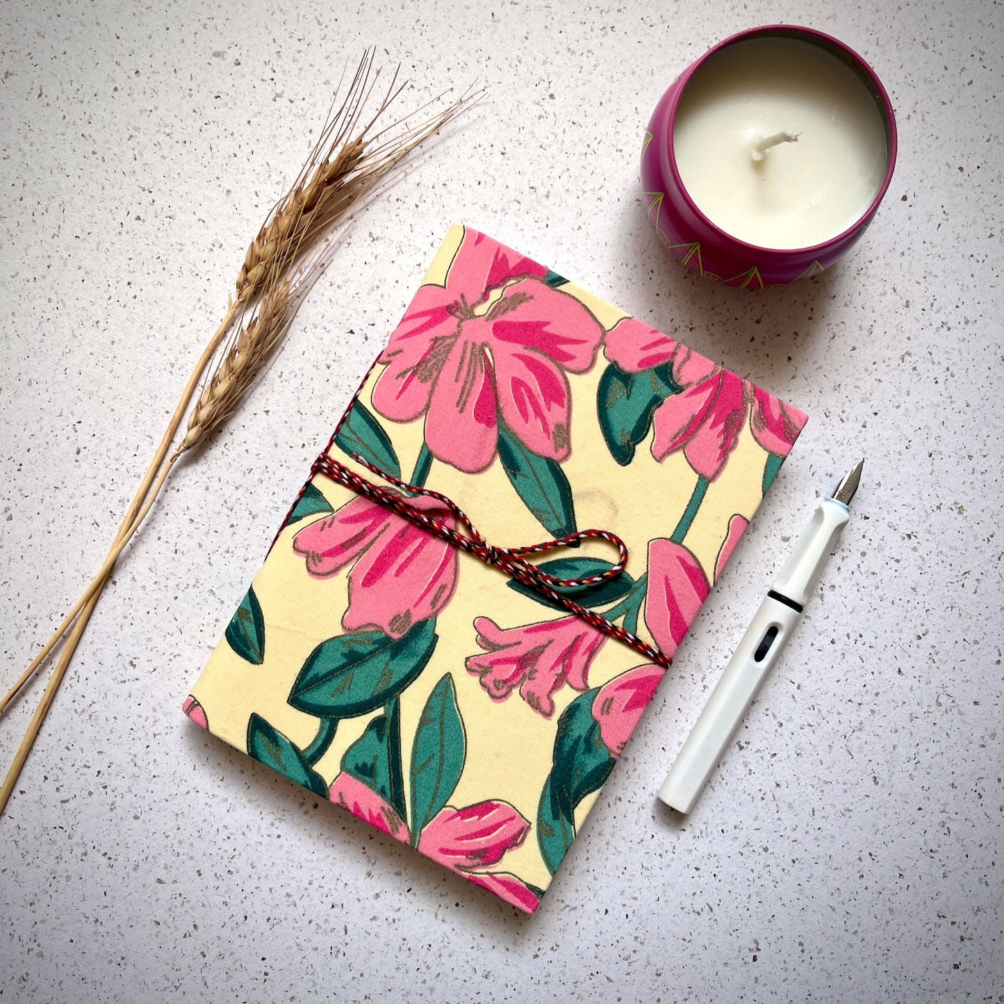 Magnolia Floral Pink Diary styled flatlay with writing accessories
