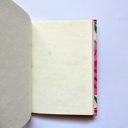 Magnolia Floral Pink Diary opened to show handmade paper pages