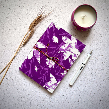 Floral Silhouette Purple Diary styled flatlay with writing accessories