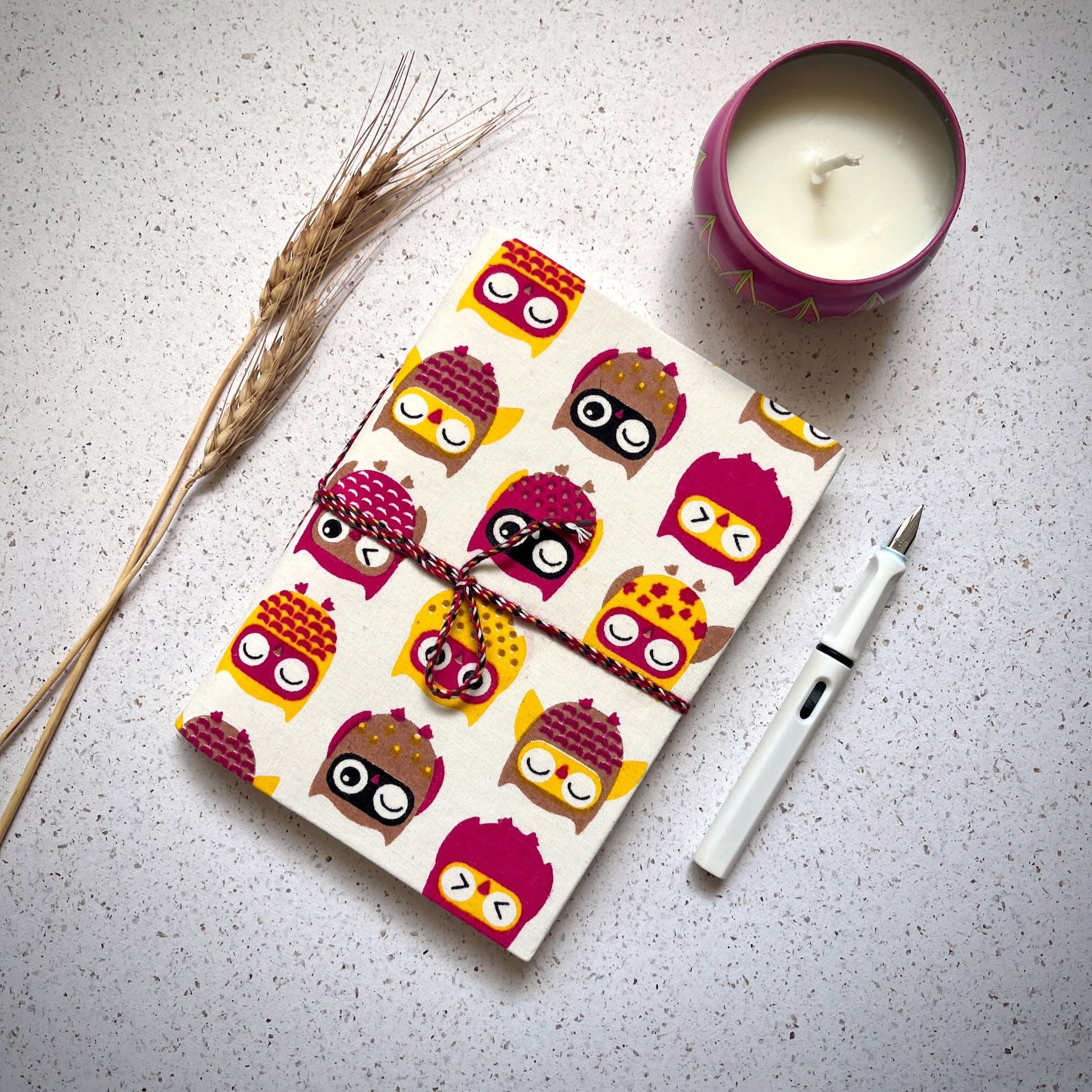 Owl Print Red Diary styled flatlay with writing accessories