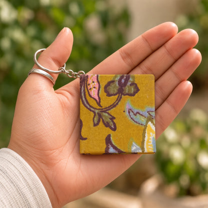 Yellow Floral keychain diary in hand