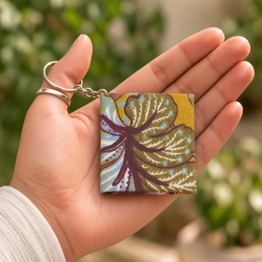 Yellow Leaf keychain diary in hand