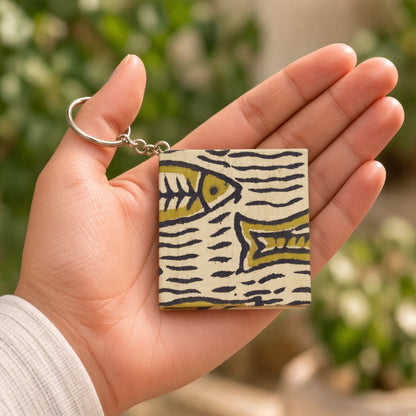 Off-white Fish keychain diary in hand