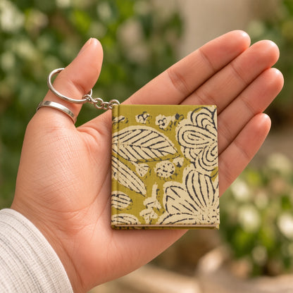 Green Floral keychain diary in hand