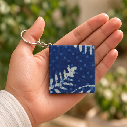 Blue Dot keychain diary in hand
