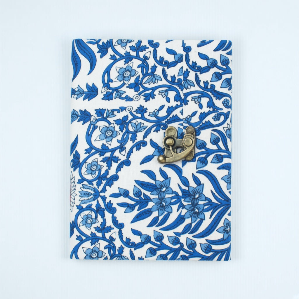 Blue Vine lock diary on a plain background