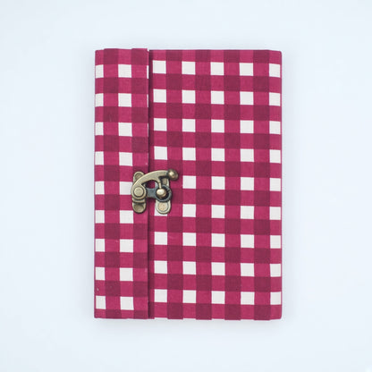 Pink Check lock diary on a plain background