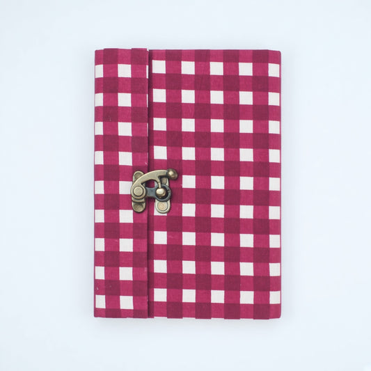 Pink Check lock diary on a plain background