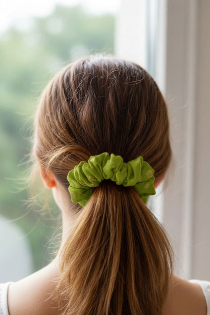 Green Textured scrunchie worn in hair
