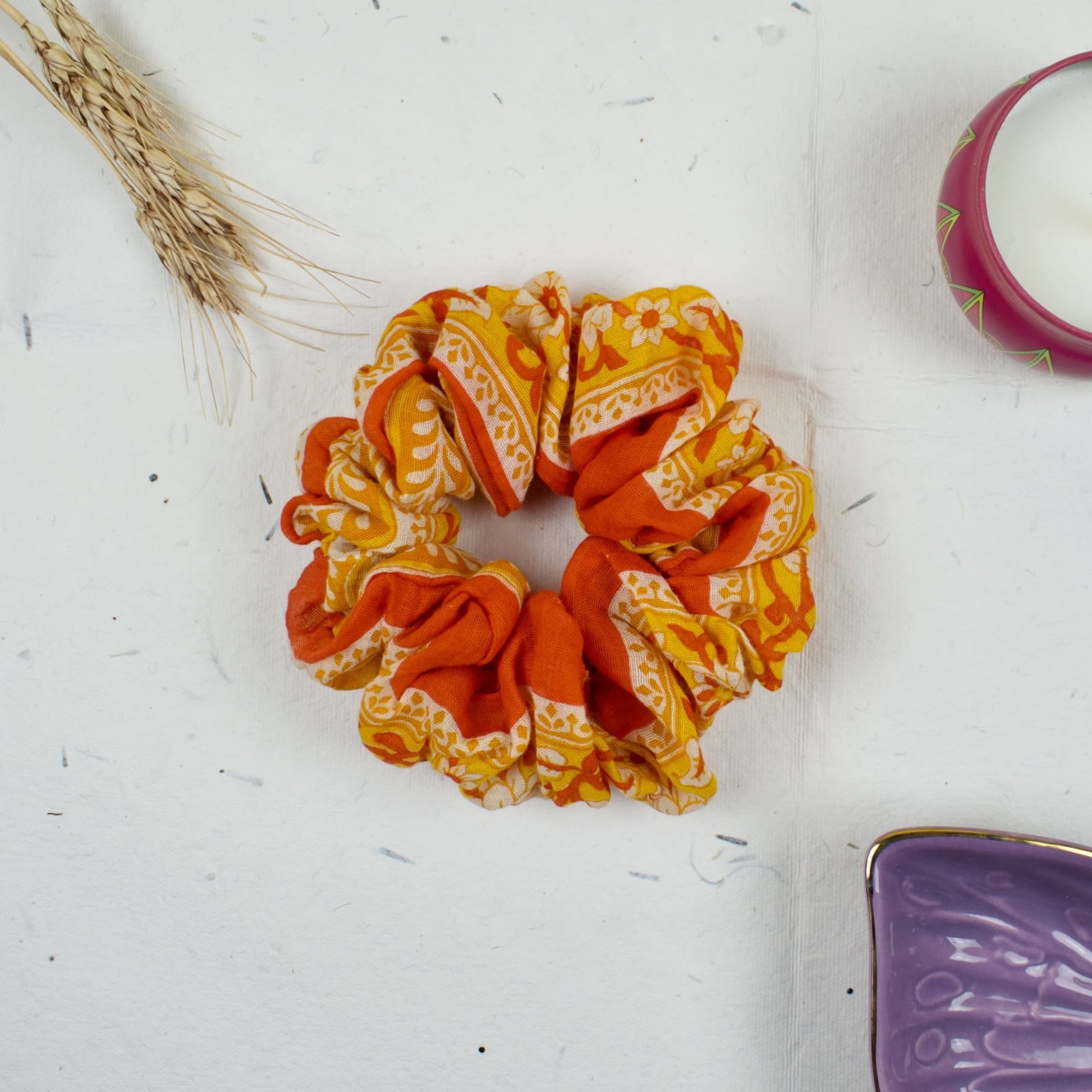 Orange Ethnic Print scrunchie styled flatlay