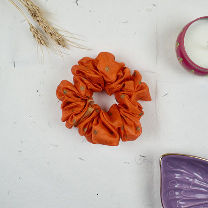 Orange Embroidered scrunchie styled flatlay